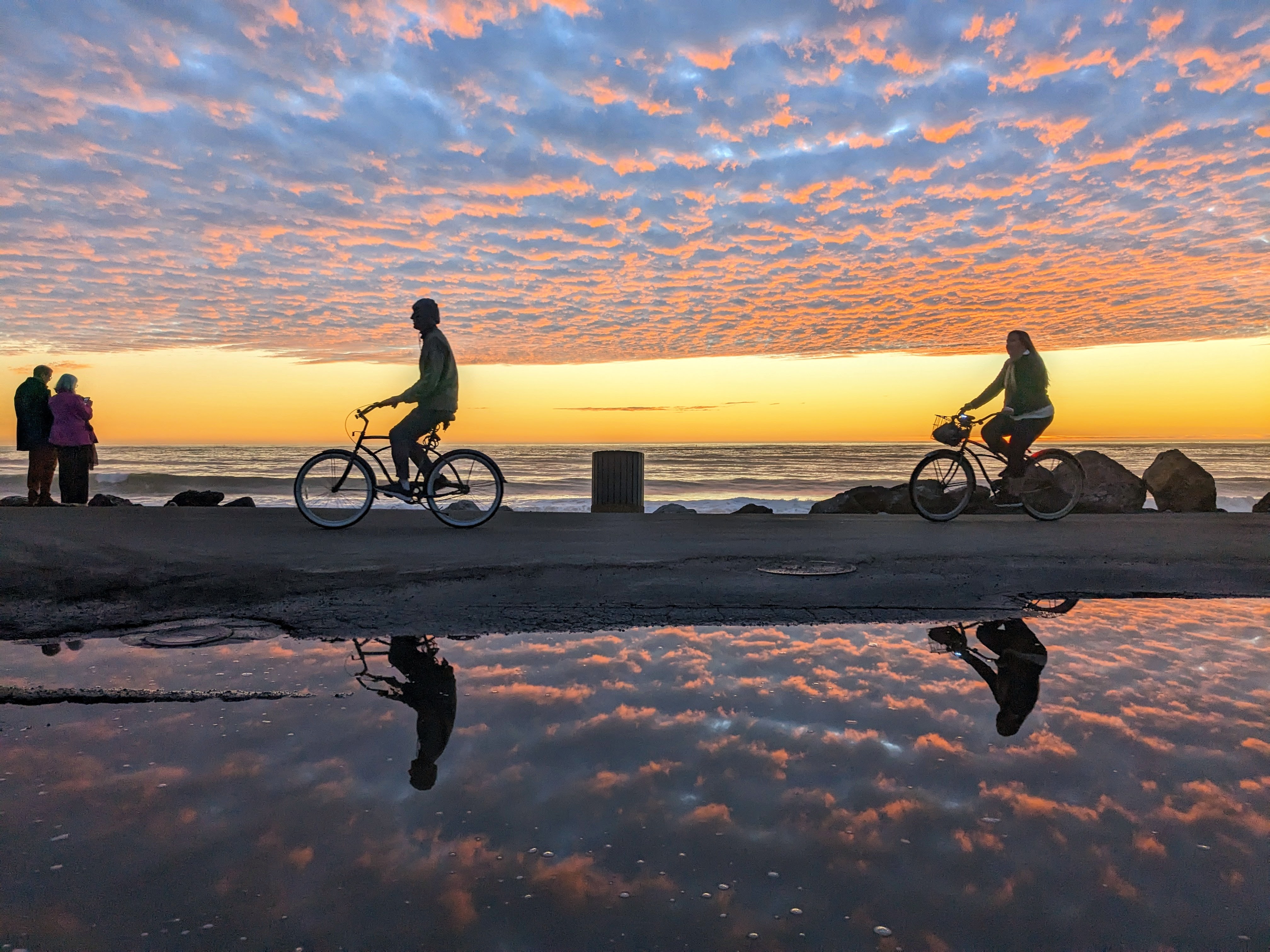 &lt;# bikes ride across a beautiful sunset #&gt;