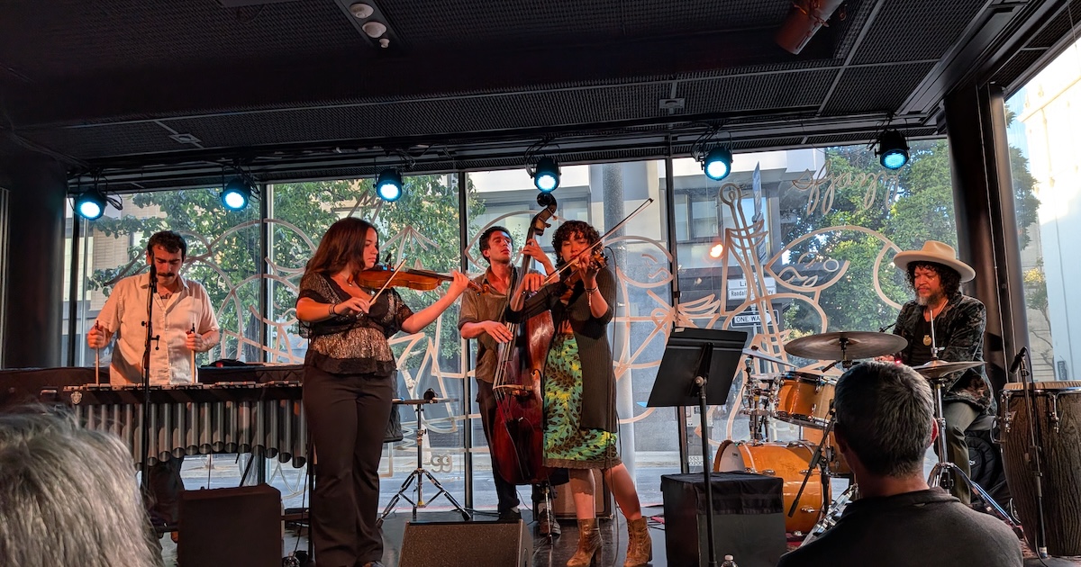 Daniel's daughters join his trio on stage
