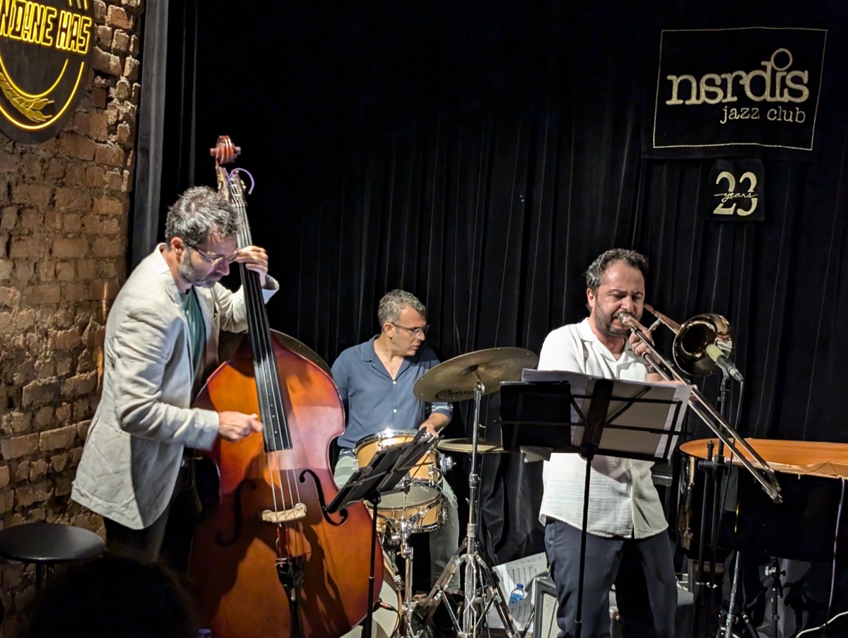 <# Trombone, Bass, and Drums on stage at Nardis #>
