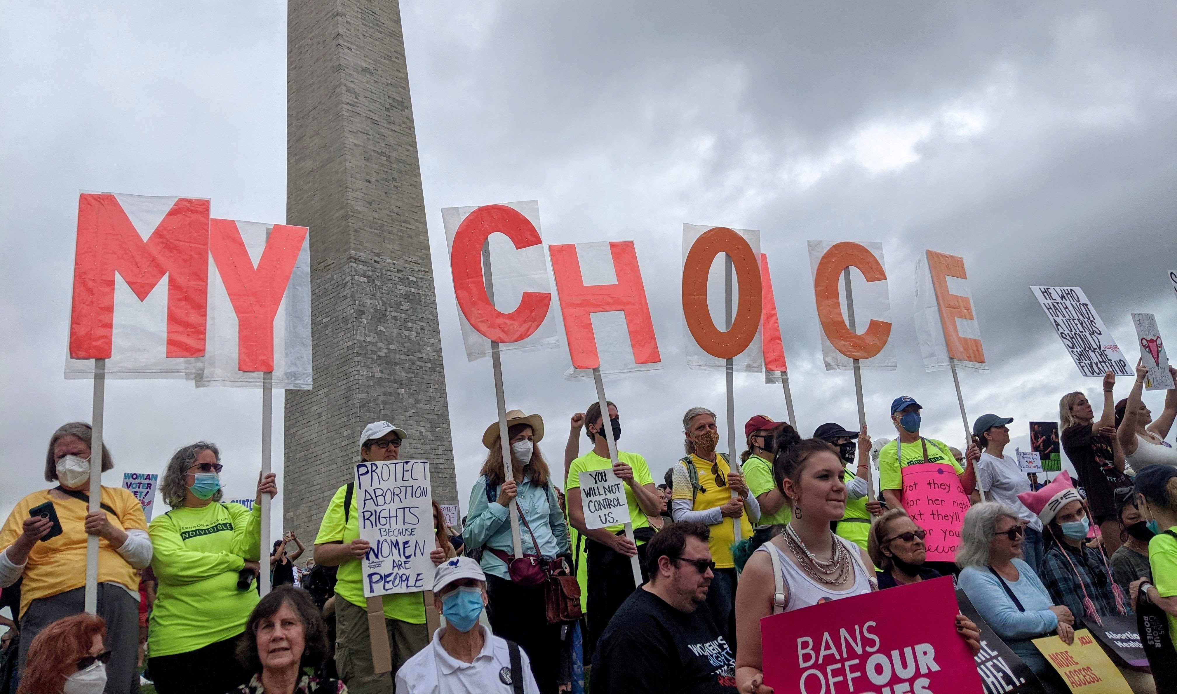 women hold my choice sign