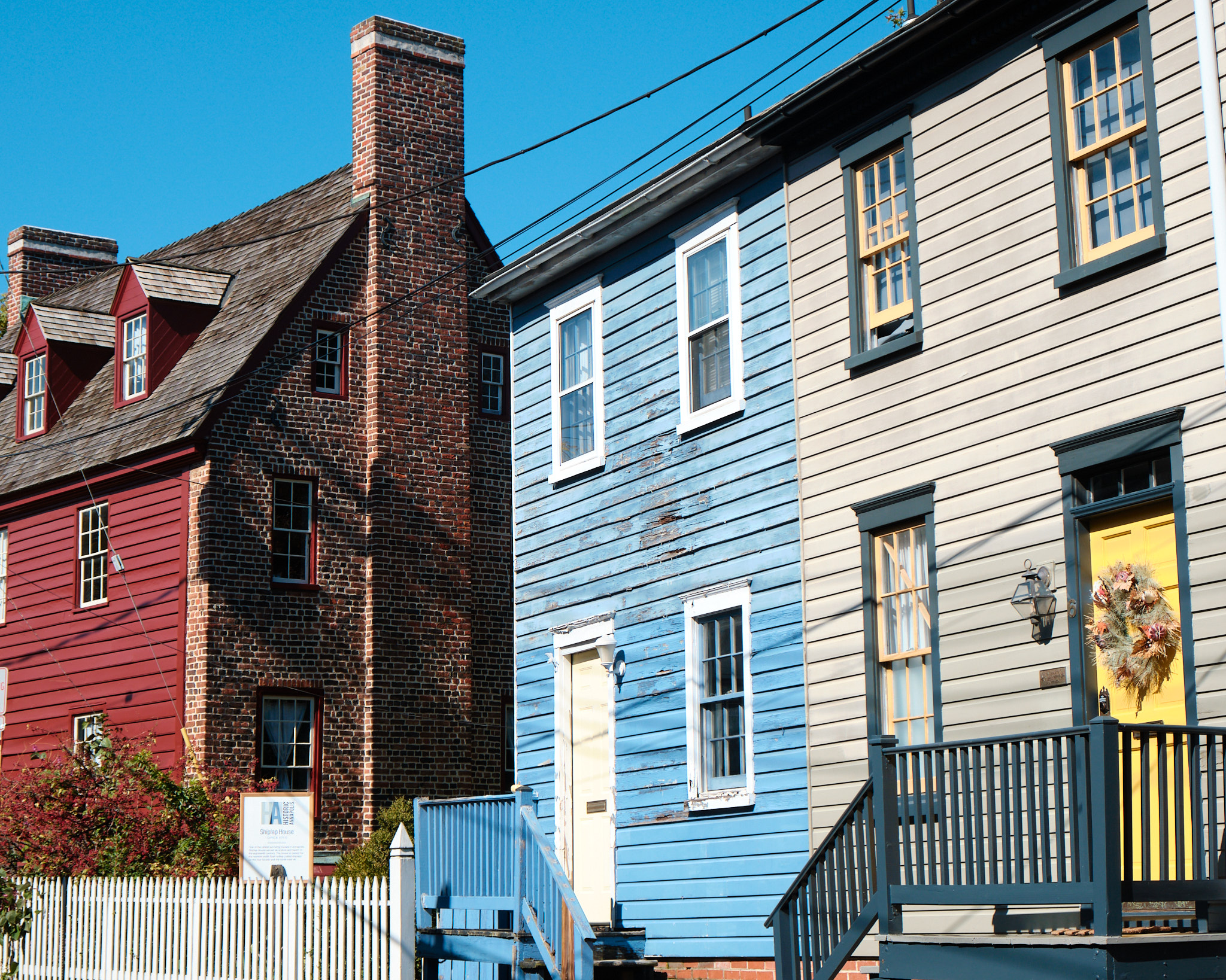 three colorful old houses in Annapolis