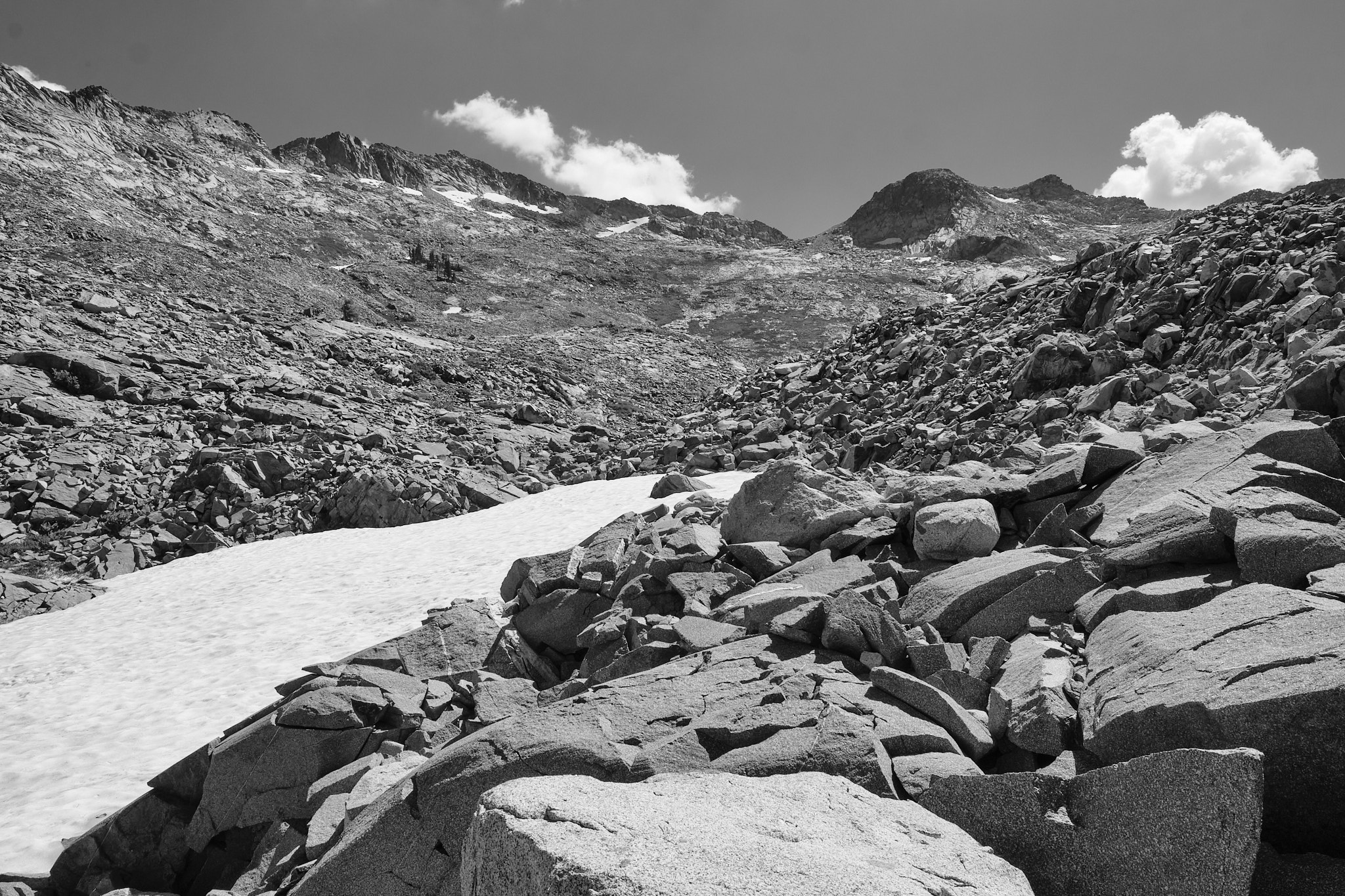 &lt;# Black and white photo of snow and view up the mountain #&gt;