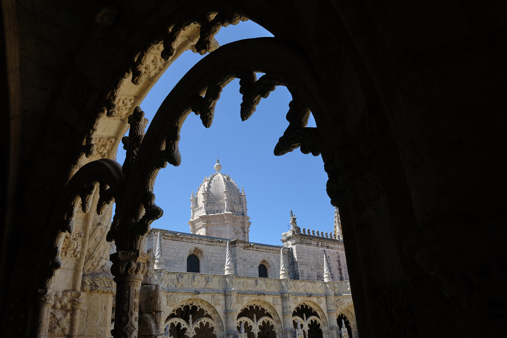 &lt;# looking through an archway at the monastery #&gt;