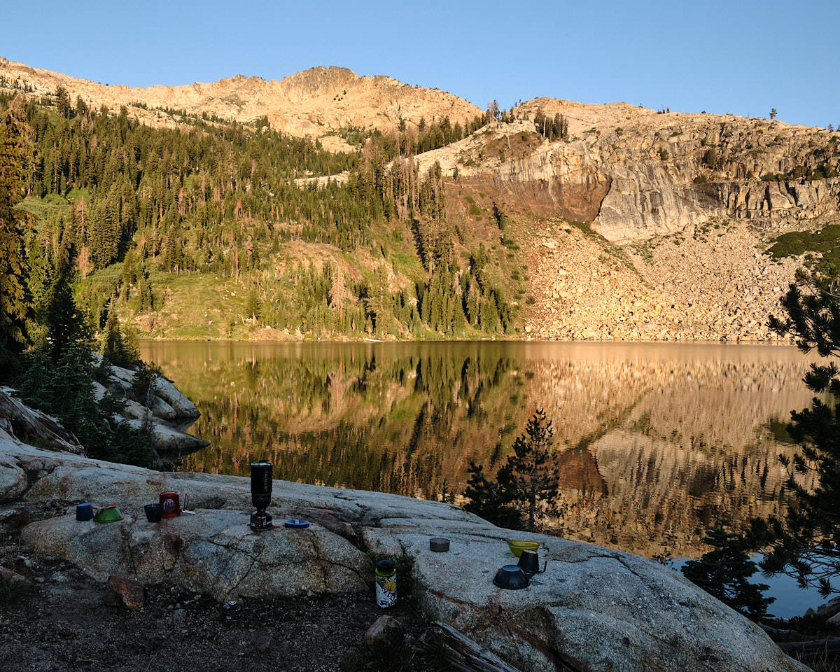 &lt;# Morning reflections on the lake, from our campsite #&gt;