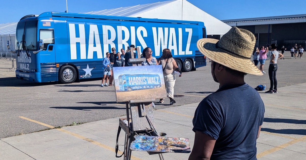 The Harris Walz bus outside the rally