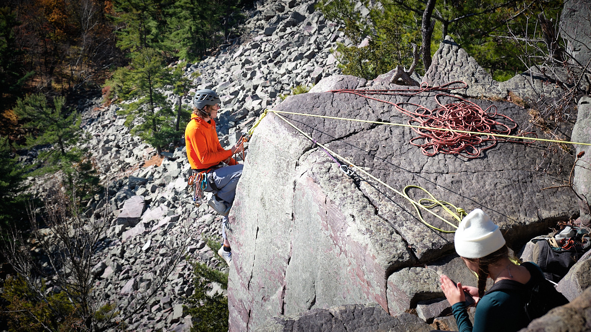 <# a rock climber on ropes #>