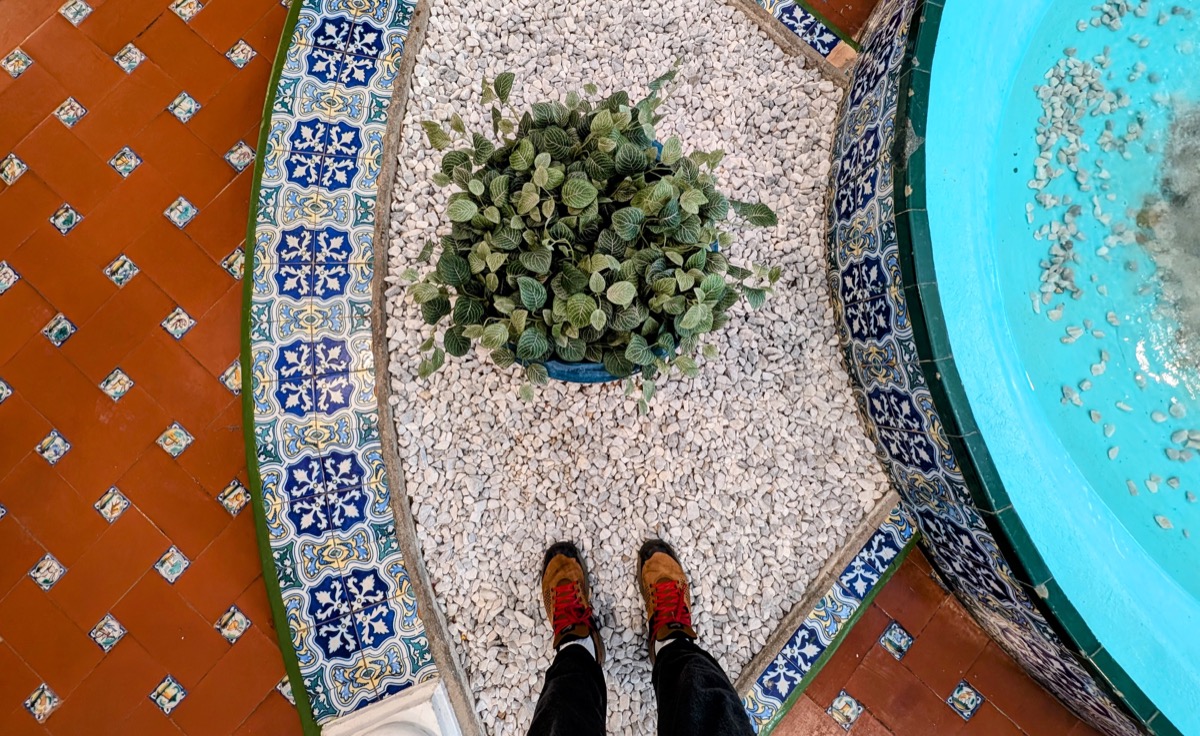 <# a photo looking down at a colorful fountain #>